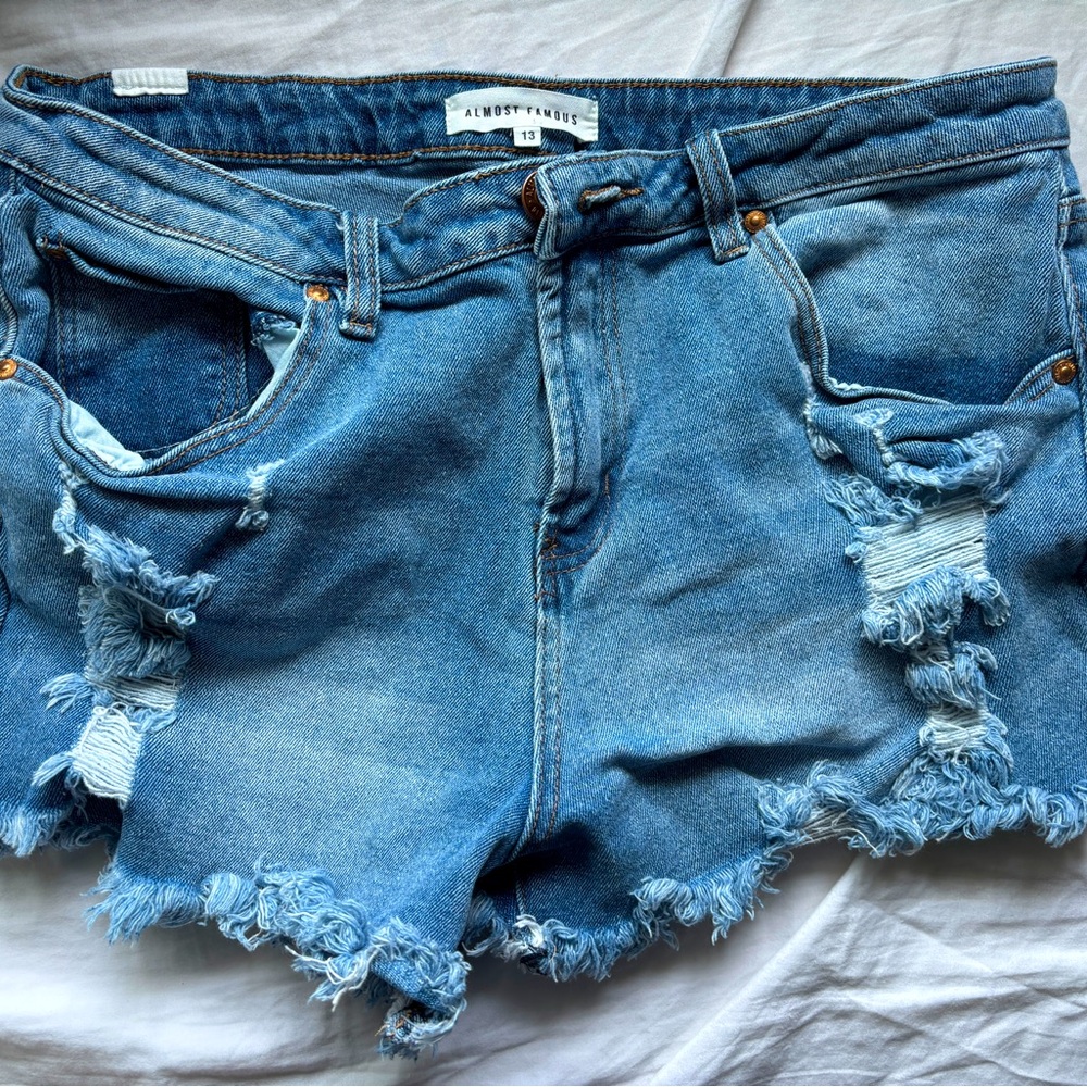Distressed shorts! Size 13, a medium light blue shade